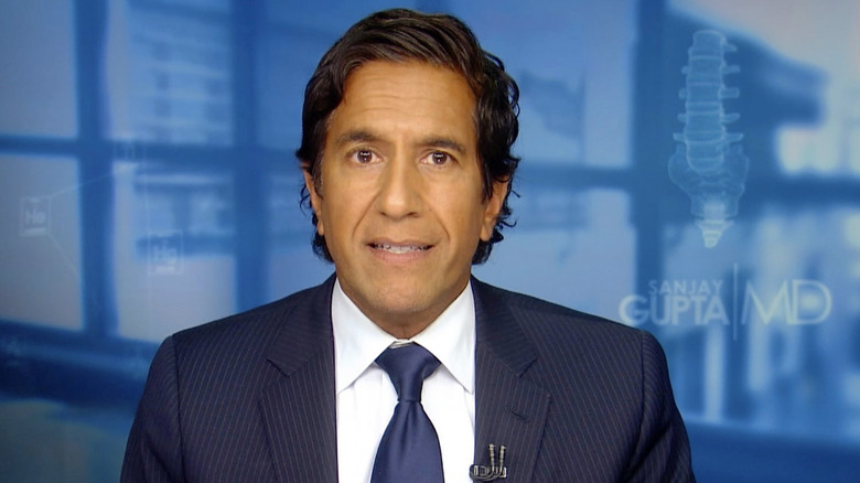 Sanjay Gupta in a suit