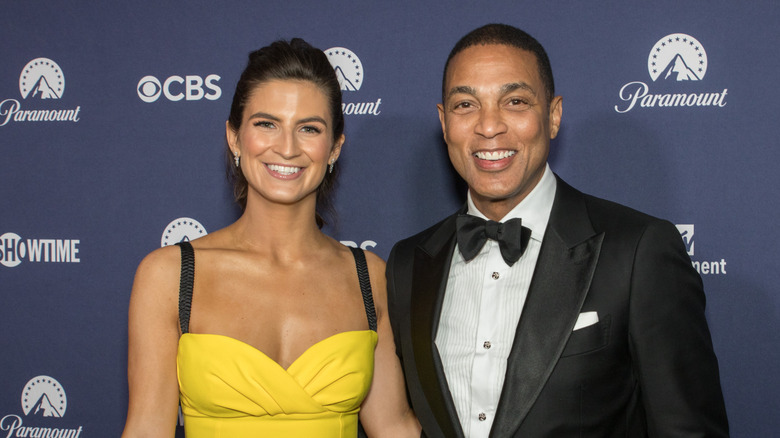Kaitlan Collins and Don Lemon posing together