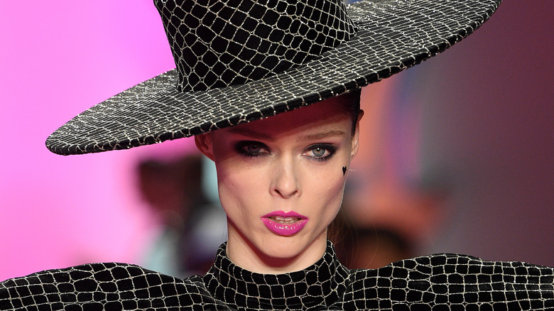 Coco Rocha walking down runway