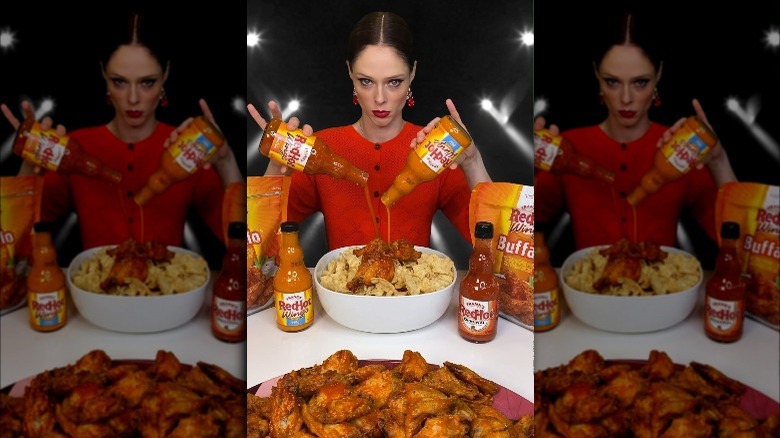 Coco Rocha pouring Frank's RedHot sauce