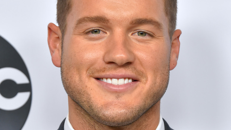 Colton Underwood smiling on red carpet