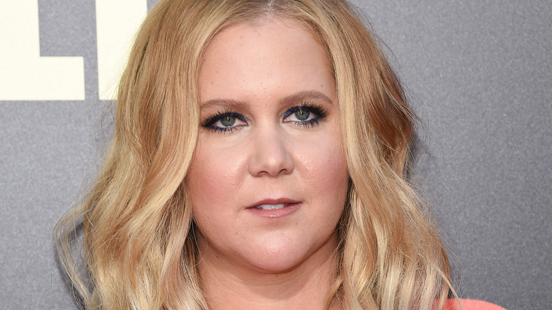 Amy Schumer looking away
