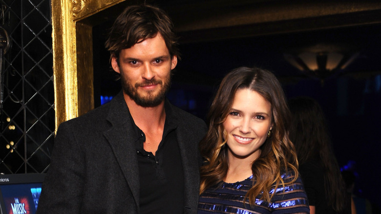 Austin Nichols and Sophia Bush smiling