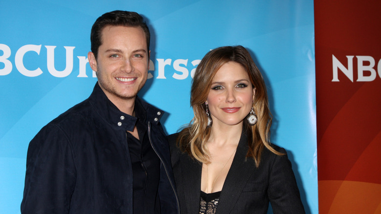Jesse Lee Soffer and Sophia Bush smiling