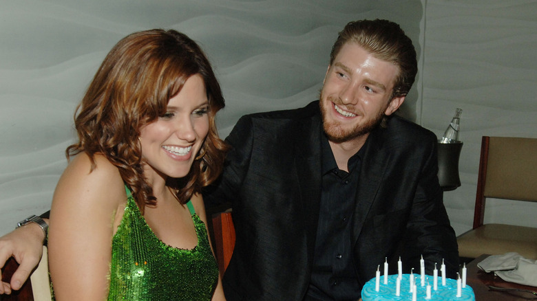 Sophia Bush laughing and Jon Foster smiling