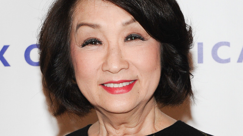 Connie Chung smiling into the camera at event