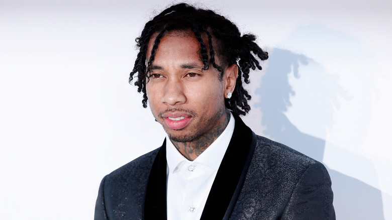 Tyga posing on red carpet