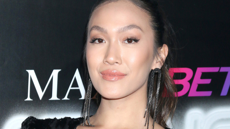 Tammy Ly with long earrings