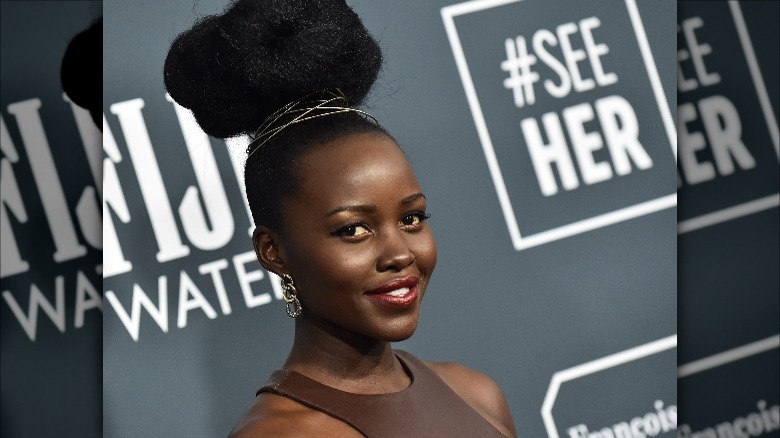 Lupita Nyong'o on a red carpet