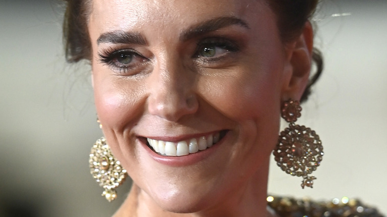 Kate Middleton smiles on the red carpet