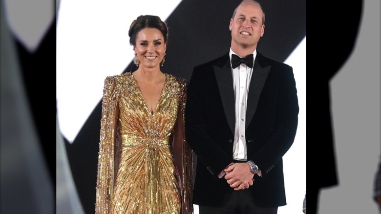 Kate Middleton and Prince William smile on the red carpet