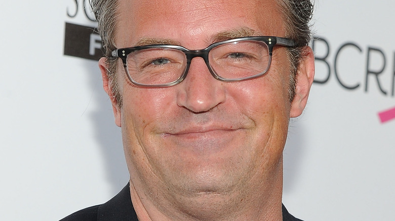 Matthew Perry looking into the camera