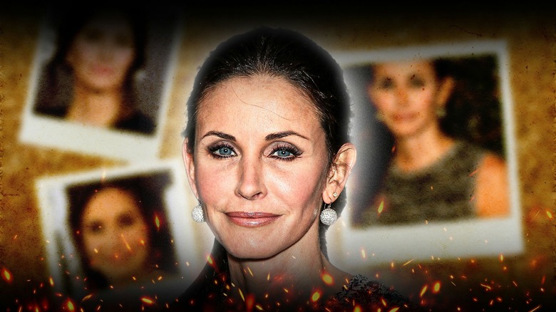 Courteney Cox in front of three polaroid photos of herself