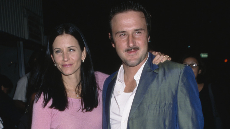 Courteney Cox and David Arquette posing and smiling