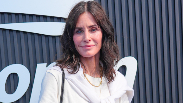 Courteney Cox wearing all white