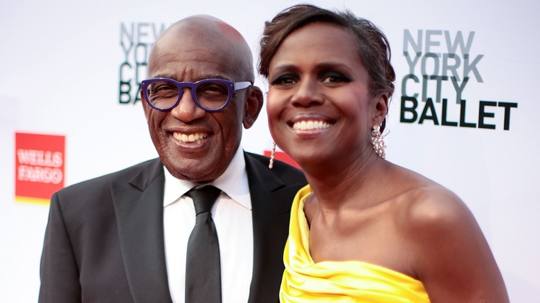 Al Roker and Deborah Roberts pose