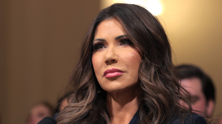 Kristi Noem looking into the distance.