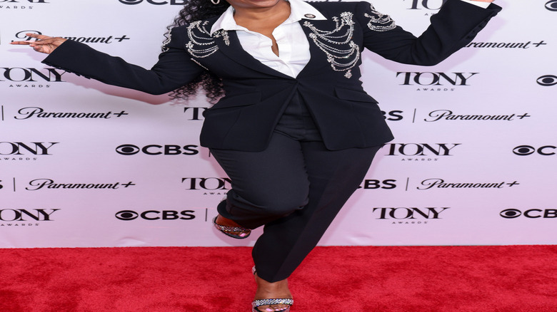 Kandi Burruss posing and smiling