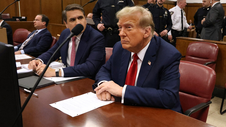Donald Trump sitting in court room
