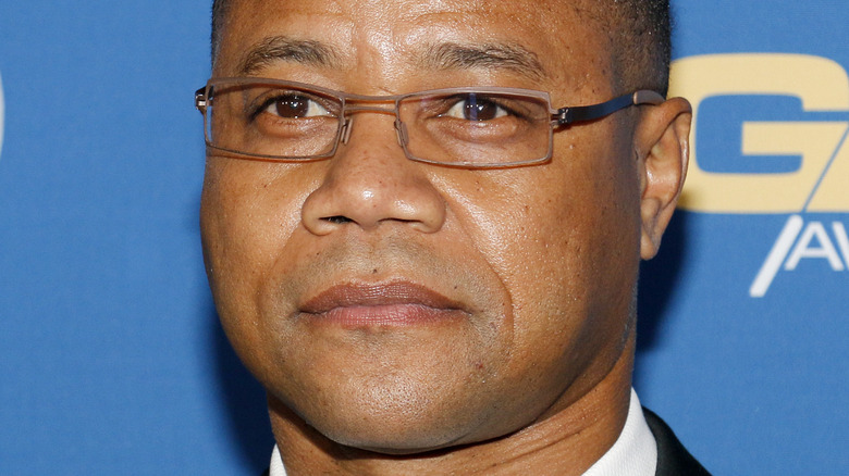 Cuba Gooding Jr. poses with glasses 