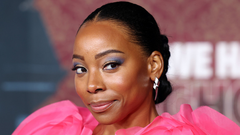 Erica Ash wearing pink at an event