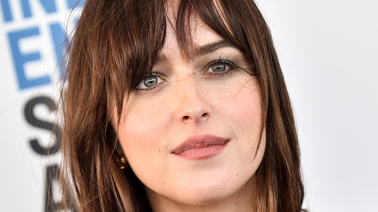 Dakota Johnson long brown hair bangs