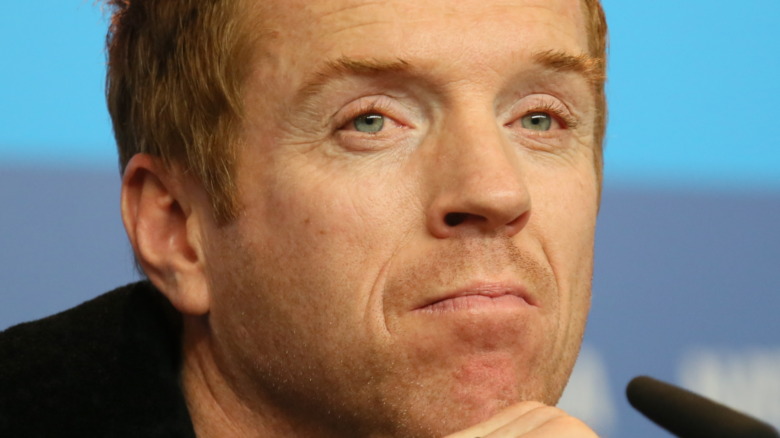 Damian Lewis staring sadly