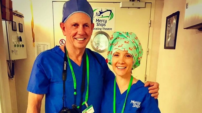Dana Perino and Peter McMahon dressed in scrubs.