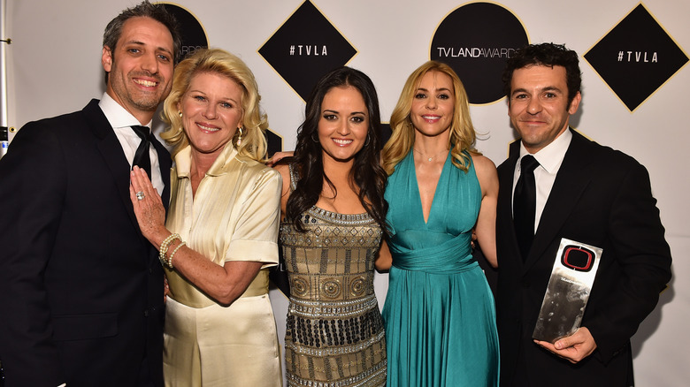 Danica McKellar smiling while posing with Josh Saviano, Alley Mills, Olivia d'Abo and Fred Savage