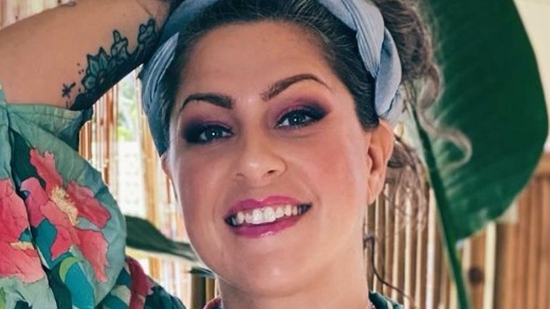 Danielle Colby smiles in a Instagram picture
