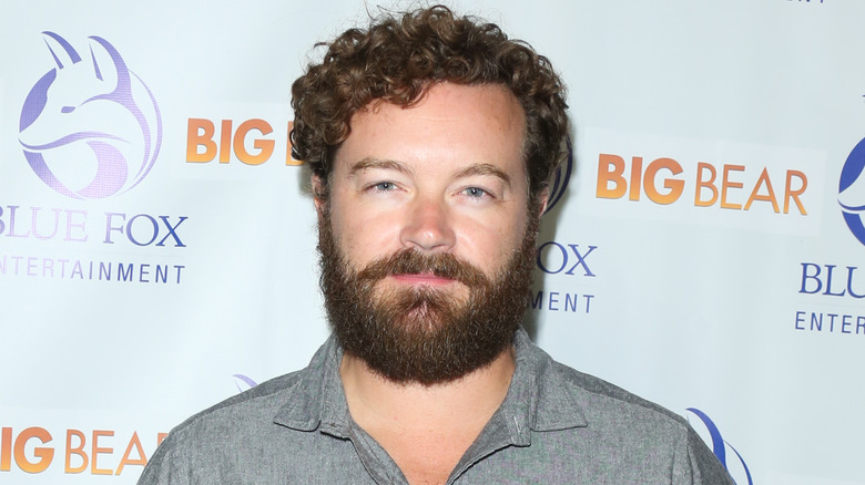 Danny Masterson with full beard smiling