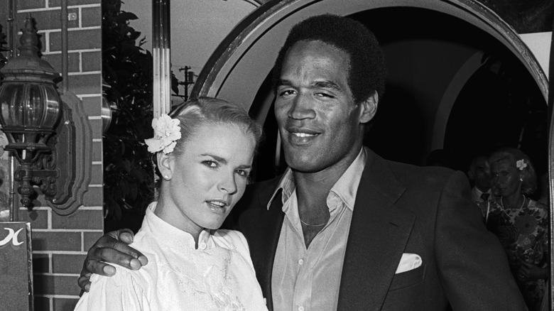 Nicole Brown and O.J. Simpson pose together