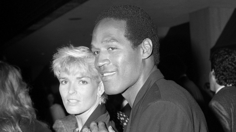 Nicole Brown and O.J. Simpson pose together