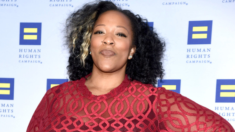 Frenchie Davis at an event, smiling