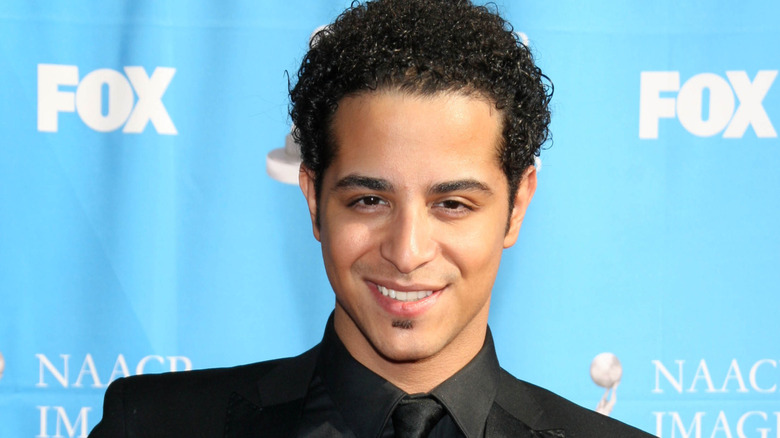 Mario Vazquez at an event, smiling