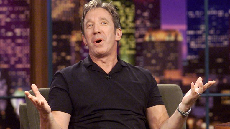 Tim Allen shrugging during a talk show appearance