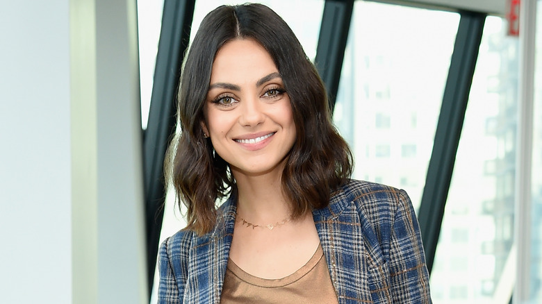 Mila Kunis smiling