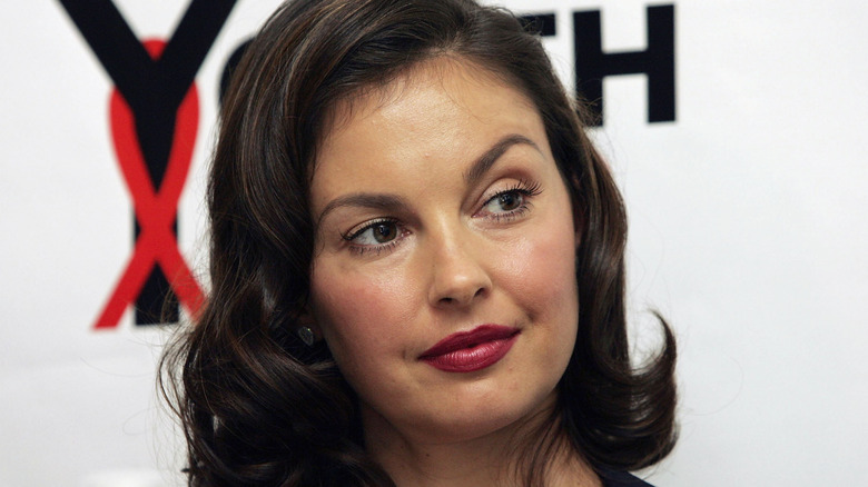 Ashley Judd looking off to the side
