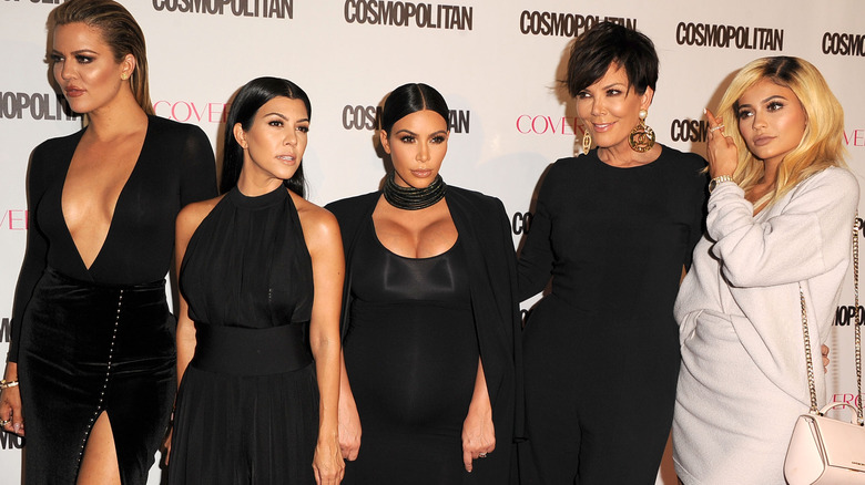 The Kardashians posing with Kris and Kylie Jenner