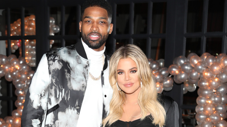 Tristan Thompson and Khloe Kardashian posing