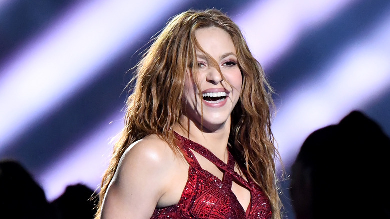 Shakira smiling on stage