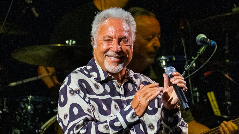 Tom Jones smiling on stage