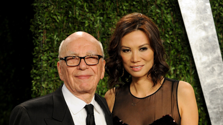 Rupert Murdoch and Wendi Deng posing on the red carpet