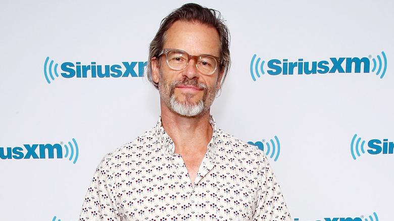 Guy Pearce in white shirt