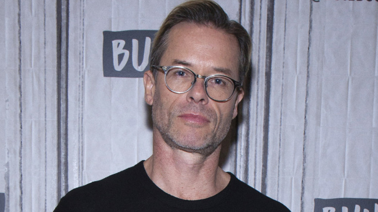 Guy Pearce in black shirt