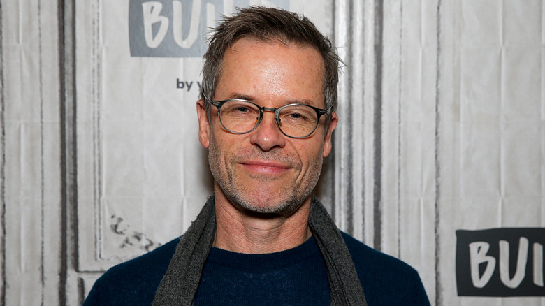 Guy Pearce in silver glasses