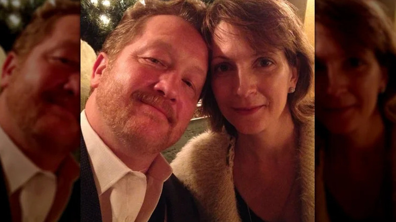 Christian Stolte and Kim Whitehead-Stolte posing for cameras