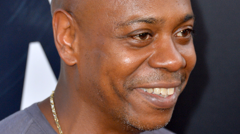 Dave Chappelle smiling in 2018