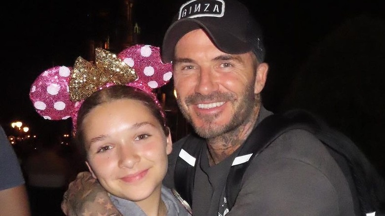 David Beckham posing with daughter Harper Seven