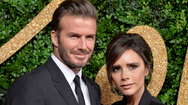 David and Victoria Beckham posing